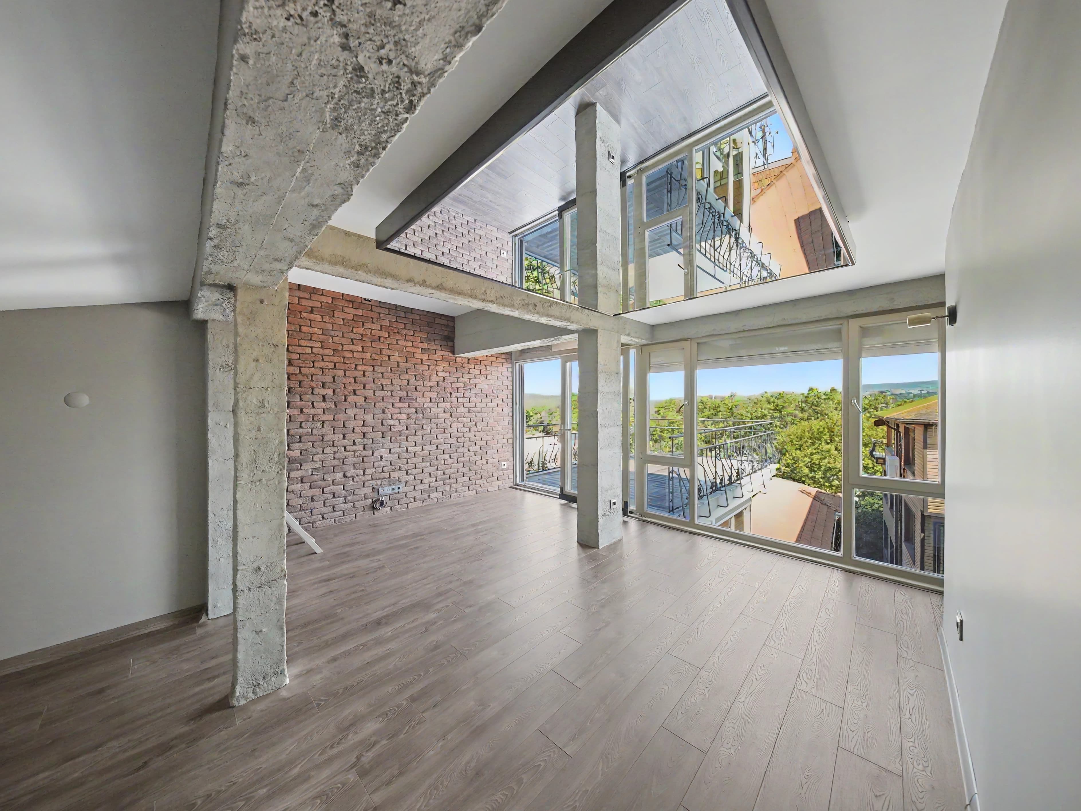 Daylit panoramic living area inside a fully renovated Yenikoy triplex villa